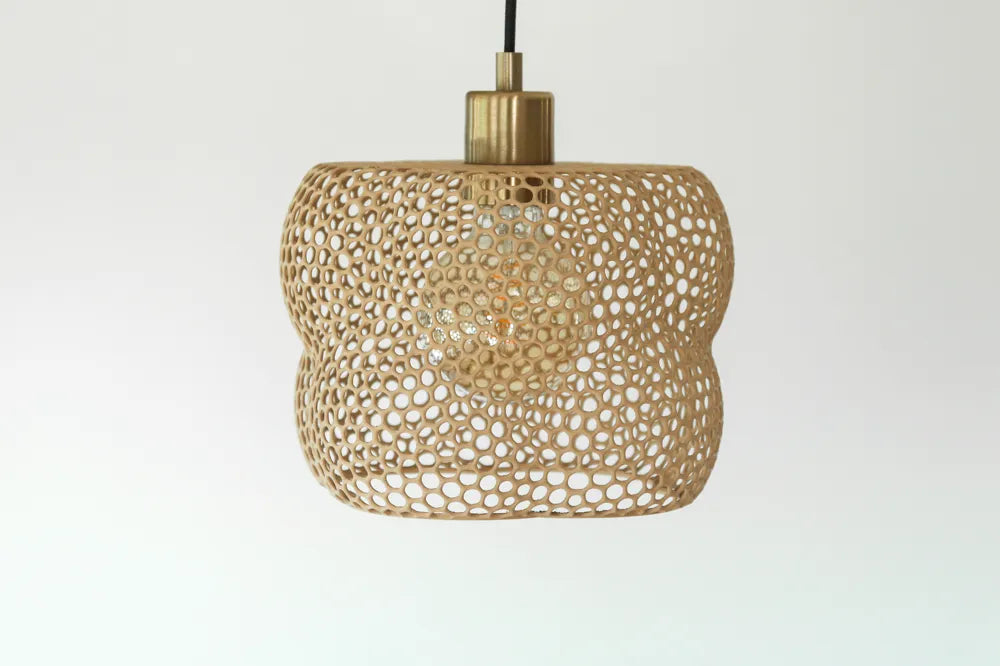 Suspension Corail beige doré et son motif ajouré