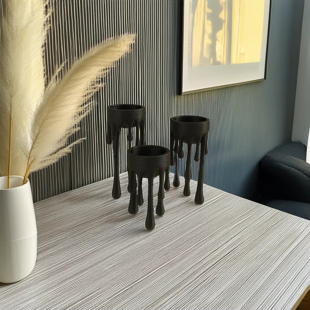 Set de 3 bougeoirs drip noirs sur table avec pampa, ambiance sombre