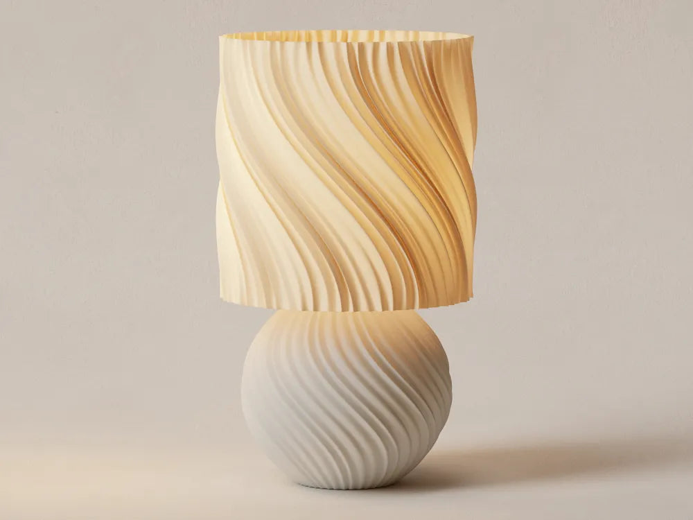 Lampe cylindrique spiralée allumée ton doré chaud