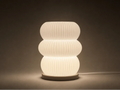 Luminaire Galet présenté allumé